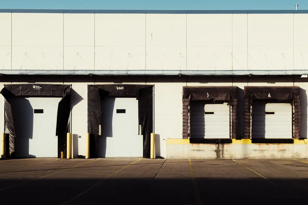Loading dock bays with commercial overhead doors