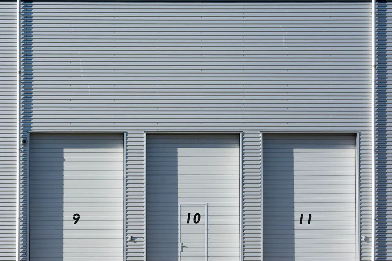 Row of numbered commercial overhead doors
